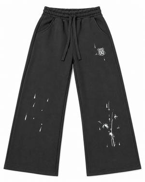 UNLIBERTÉ black graphic sweatpants — approved front product view