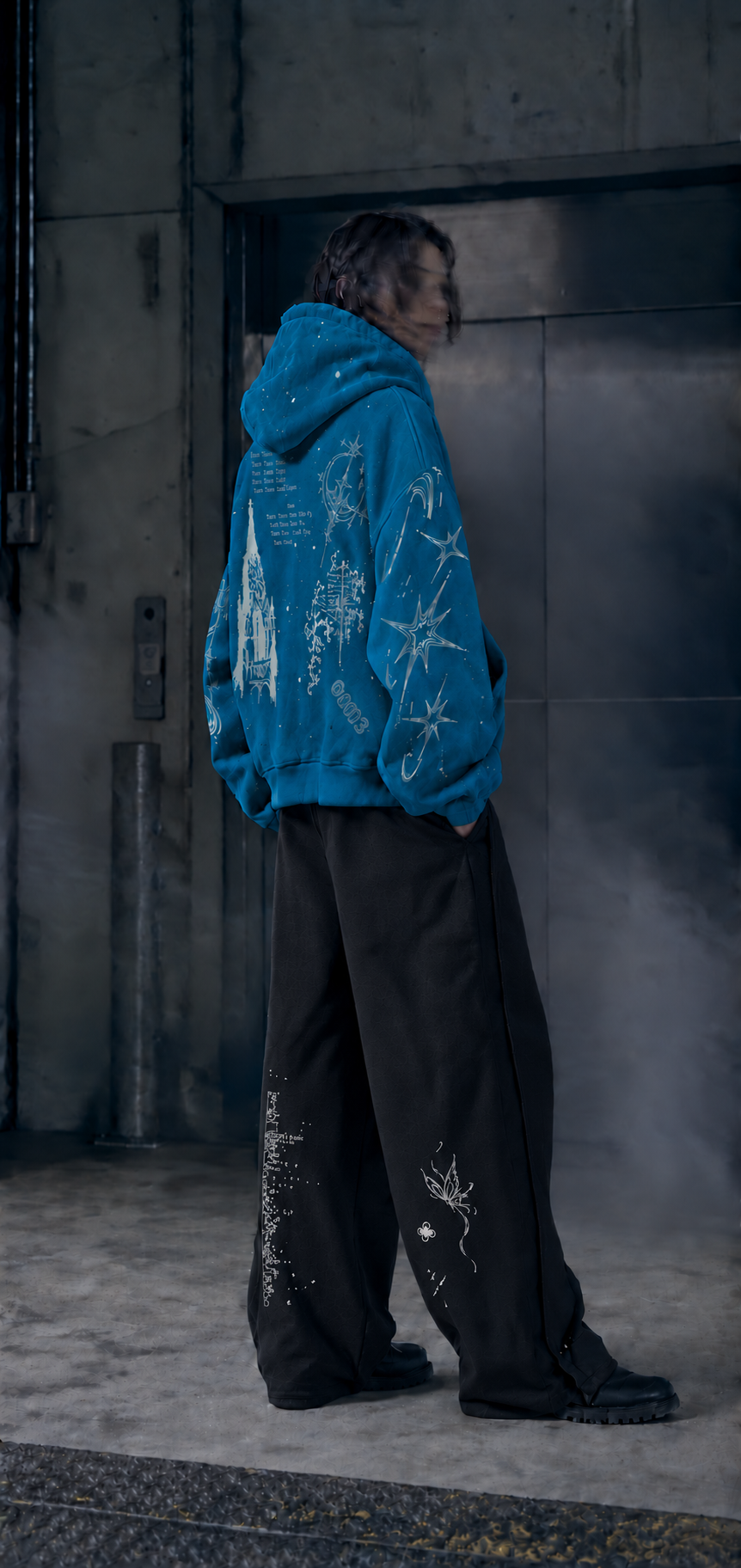 UNLIBERTÉ Look 01 — blue zip hoodie and black graphic pants